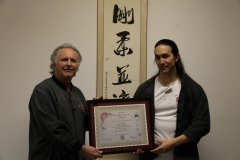 Sifu Allan Graham presenting Brendan with his Second Level (Grade 7) - 2012